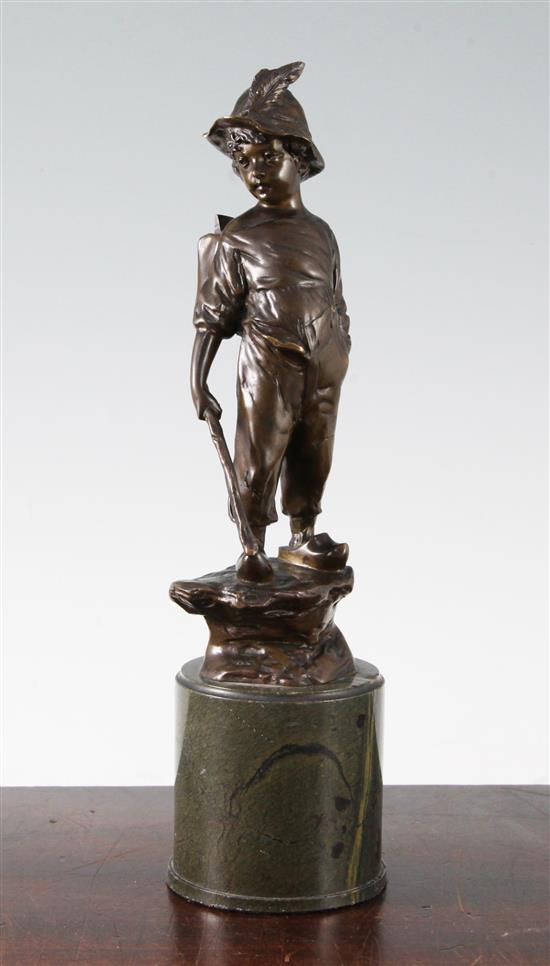 Paul Ludwig Kowalczewski (German, 1865-1910). A bronze figure of a boy wearing a backpack, overall H.11in.